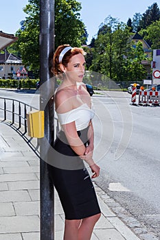 Red-headed elegant woman