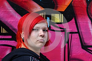 Red heared woman with graffity background photo