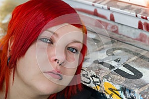 Red heared woman with graffity background photo