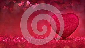 Red heart as furry cushion concept on glamour bright bokeh background.