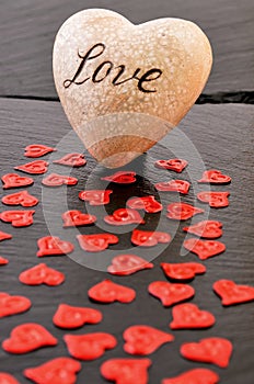 Red Heart On Black Stone Background. Love and Valentines Day Concept.