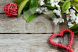 Red heart with blossoms petals