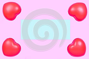 Red heart with Blue copyspace for write texture on pink pastel background for valentine day