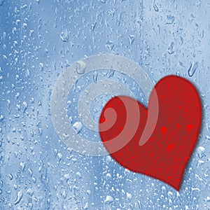 Red heart on blue wet glass. Love concept. Valentines Day.