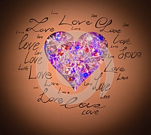 Red heart on a brown background with written words of love