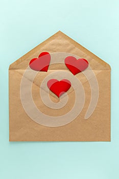 Red heart on brown envelope. Love letter for valentine`s day.