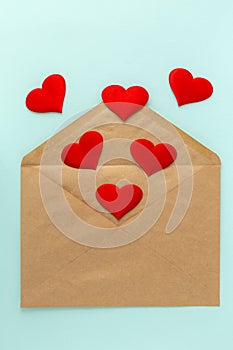 Red heart on brown envelope. Love letter for valentine`s day.