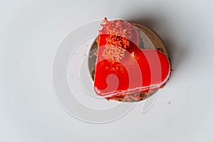 Red heart cacke isolated on white. Pastry heart with jelly