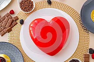 Red heart cake . Valentines Day dessert.Mousse Cakes and chocolate decor .wedding dessert cake with berries.Cake for a