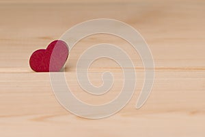 Red Heart In Crack Of Wooden Plank