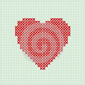 Red heart embroider by thread on turquoise background. Cross stitching on canvas.
