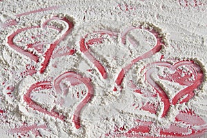 Red heart on flour background