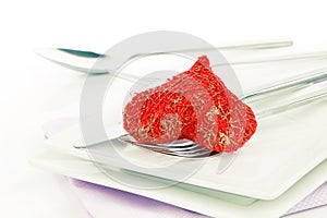 Red heart with fork. Concept image for Valentine dinner