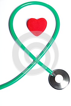 Red heart and green stethoscope isolated