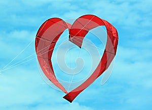 Red Heart Kite in a Blue Sky