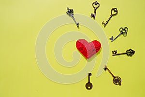 Red heart lock with key lean against vintage pole, vlentine love symbol.Valentines unlock love concept. Red heart and