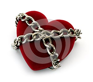 Red heart locked with chain