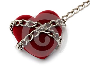 Red heart locked with chain