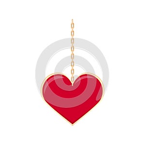 Red heart locket on a gold chain.