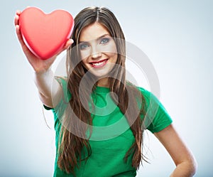 Red heart. Love symbol. Portrait of beautiful woman hold Valent