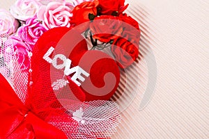 Red heart with love word and roses