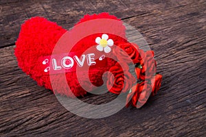 Red heart with love word and roses