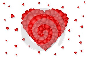 Red heart made up of small hearts on a white background. Isolated. Valentine`s Day, Mother`s Day background.