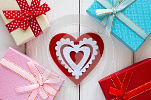 Red heart next to the gift boxes