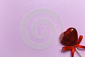 red heart on a pink paper with negative space, love symbol
