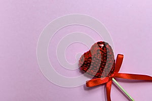 red heart on a pink paper with negative space, love symbol