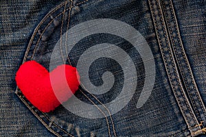 Red Heart put on an old blue jeans. Means love for denim.