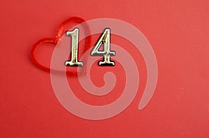 Red heart on red background with number 14. Valentine`s day, anniversary, mother`s day, marriage concept, invitation e-card