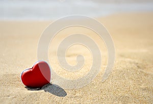 Red heart on sea beach - love Valentine's Day concept