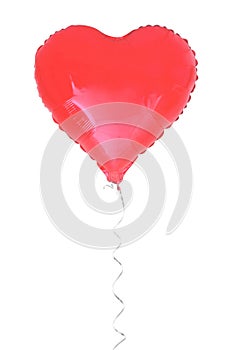 Red heart shaped balloon isolated on white