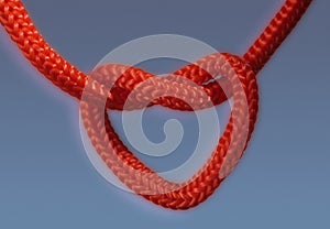 Red heart shaped knot