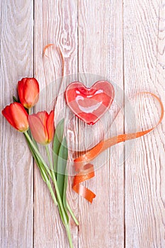 Red heart shaped valentine with tulips
