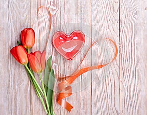 Red heart shaped valentine with tulips