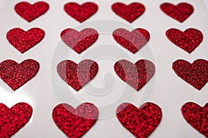 red heart shapes on the white background in valentine\'s day