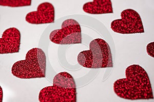 Red heart shapes on the white background in valentine\'s day