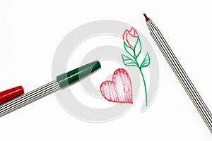 Red heart sign with red rose with green handle on white background