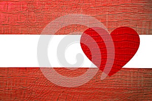 red heart sign, symbol with paper ribbon isolated on wooden table background. mock up, empty copy space for inscription 14th