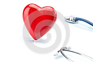 Red heart with stethoscope isolated on white background