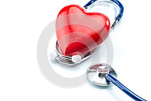 Red heart with stethoscope isolated on white background