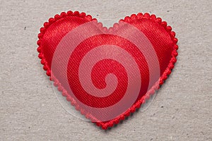 Red heart on vintage paper background