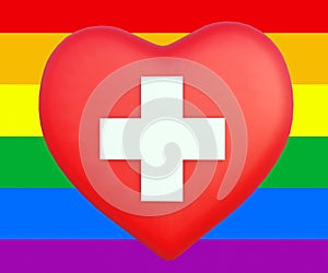 red heart with white cross in the rainbow flag