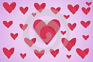 Red hearts background. Red hearts on pink purple backgrounds. Group of love shaped backgrounds. Red love symbol pattern