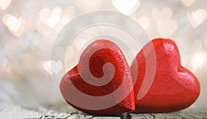 Red hearts on bokeh background