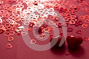 Red hearts glitter confetti Valentine day abstract background