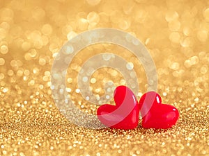 red hearts on gold bokeh background