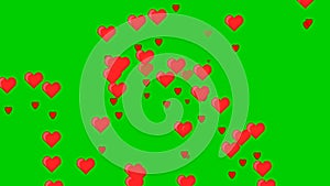 Red hearts isolated on green background move raning 4k footage.